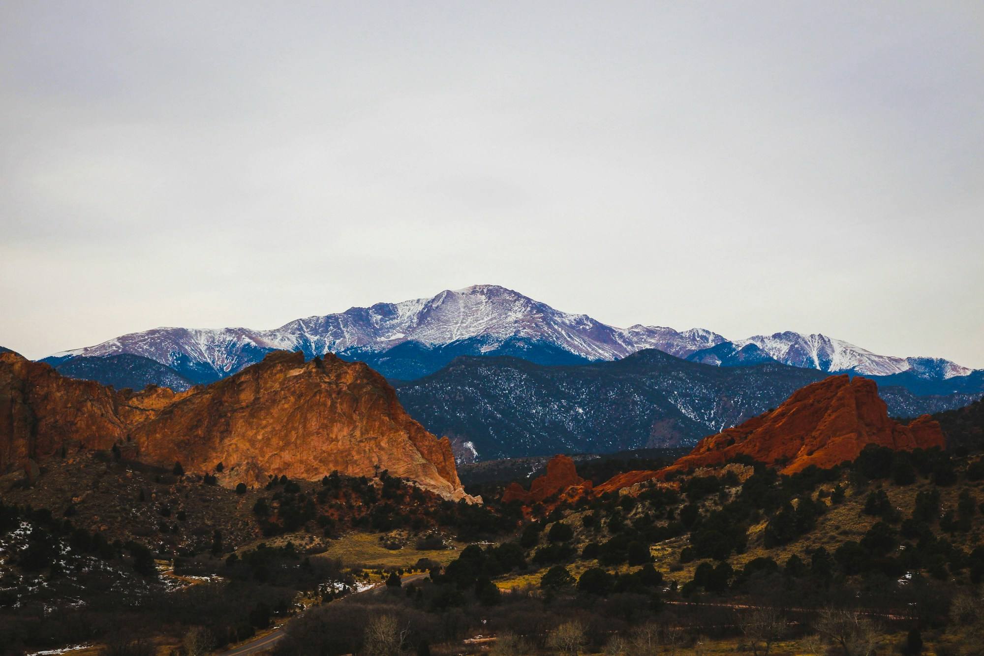 Pikes Peak above the red rocks of Garden of the Gods in Colorado Springs